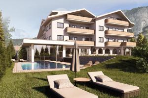 a rendering of a hotel with a swimming pool at Hotel Dorfer Alpine&Charming in Selva di Val Gardena
