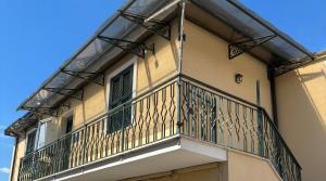 a balcony on the side of a building at Guest House Marittima in Frosinone