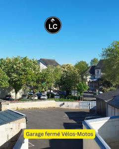 a frisbee in the air over a parking lot at The Originals Access, Hotel Le Canter Saumur in Saumur