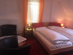 Postel nebo postele na pokoji v ubytování Bed & Breakfast Goldener Stiefel