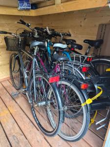 a group of bikes parked in a garage at Pas Rasą in Palanga