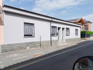 a white building on the side of a street at Casa Paglietta None in None