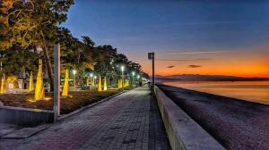 a street with lights on the side of a road at Hotel Tamarastan in Kobuleti