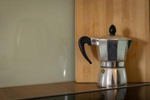 a coffee pot sitting on top of a counter at Štanjelski Razgledi AR in Štanjel