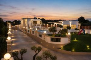 an aerial view of a villa at night at Luxury Villa John in Panormos Rethymno