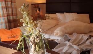 Posteľ alebo postele v izbe v ubytovaní Flairhotel am Wörthersee
