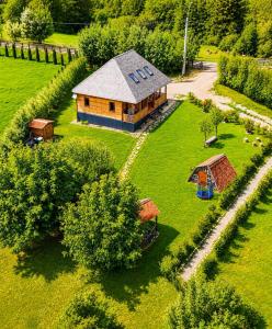 an aerial view of a house in a field at Casa WEZLY in Măgura +38 photos