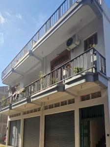 a balcony on the side of a house at East villa in Kalmunai