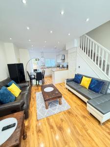 a living room with a couch and a table at Parliament in Gloucester