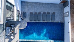 an overhead view of a swimming pool on a building at Villa Mavrem in Bezirgân