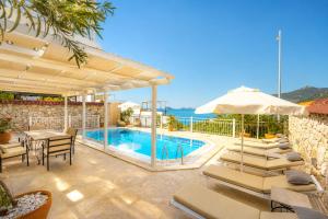 an image of a villa with a swimming pool at VILLA LEDA MARE KALKAN Sea View, Private Pool & Beach Clubs in Kalkan