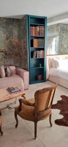 a living room with a couch and a coffee table at la suite 4 de Saint Jean in Crémieu +19 photos