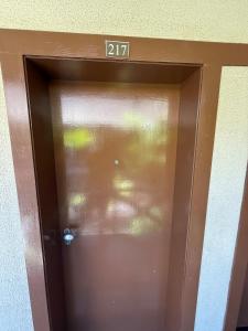 a door with the number on top of it at ECO PARADISE -Apt 212 in Caucaia +23 photos