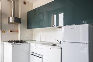 Kuchyňa alebo kuchynka v ubytovaní Saragozza Apartments