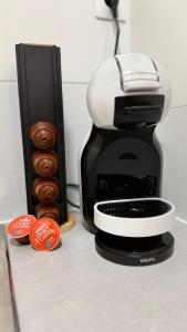 a coffee maker sitting on top of a counter at Studio Moderne - Proche 15mn Orly et 25mn Paris in Juvisy-sur-Orge