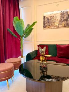 a living room with a couch and a coffee table at The Winestone Escape in Māripat