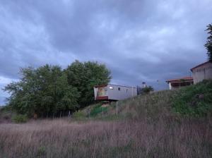 a house sitting on top of a hill at solar eclipse house in Husillos