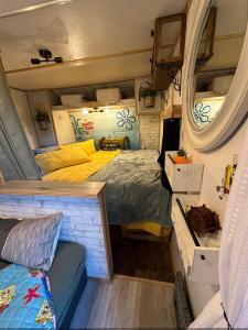 a bedroom in a tiny house with a bed at SpongeBob SquarePants on the River in Bullhead City