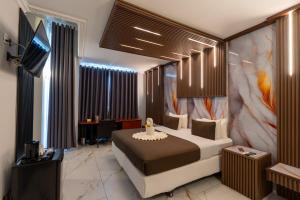 Krevet ili kreveti u jedinici u okviru objekta New Elegance hotel