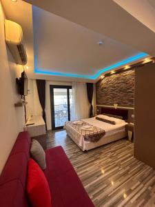 Krevet ili kreveti u jedinici u okviru objekta Hotel Falcon Home