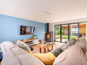 a living room with a couch and a tv at 2 Bed in Weymouth oc-75200 in Weymouth