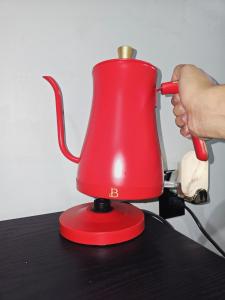 a red blender sitting on top of a table at MALE Only Shared Basement in Frederick