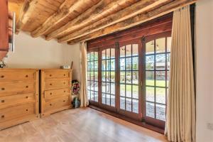 a room with a large sliding glass door at Horseshoe Pass Holiday Lets in Llangollen +29 photos