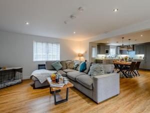 a living room with a couch and a table at 2 Bed in Weymouth oc-75201 in Weymouth