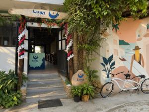 a bike parked in front of a building at Hotel Verdemar in Acapulco