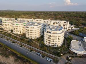 an overhead view of an apartment building with a highway at Loft Apartment - Full AC With Free Parking Pool in Cartagena de Indias