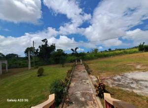 a view from the balcony of a house with a field at Berlin Ridge in Berlin +1 photo