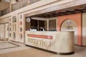 a restaurant with a reception counter in a building at Arda Turan in Khiva +98 photos