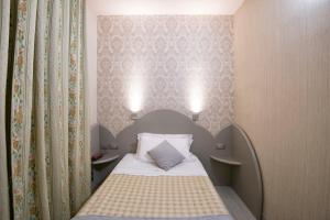 Cama o camas de una habitación en Marchi Hotel