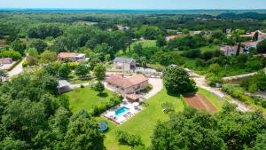 an aerial view of a house with a yard at Family Villa Krizanci Istria in Žminj