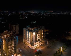an overhead view of a building at night at Cyrus One By Trivelles in Islamabad