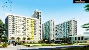 a group of tall buildings in a city at Staycation Hub in Mandaue City
