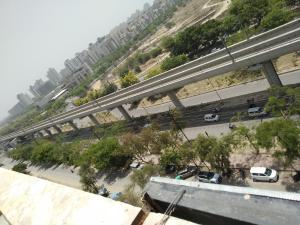 an overhead view of a highway with cars on the road at The kanha Luxury Suites in Greater Noida +1 photo