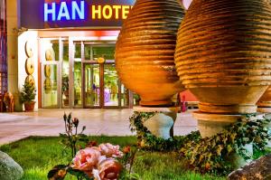 a group of large planters sitting in front of a building at Han Hotel Istanbul in Istanbul +100 photos