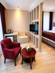 โทรทัศน์และ/หรือระบบความบันเทิงของ ARDOS PARK HOTEL