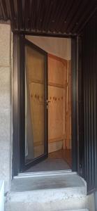 a window in a room with a wooden door at Near Train Station in Rennes +2 photos