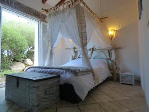 เตียงในห้องที่ Casa Di Cavalone