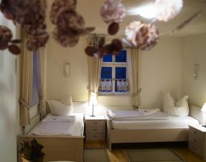 Llit o llits en una habitació de Appartementhaus am Schloss