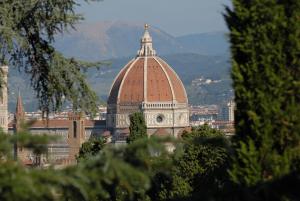 a large building with a dome on top of it at A Dream in Florence in Florence