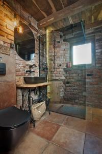 a bathroom with a sink and a bath tub at Podroom LauMarYvo in Dugo Selo +53 photos