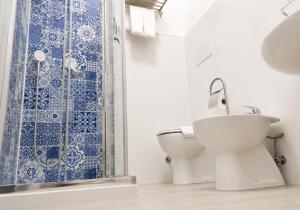 a bathroom with a toilet and a shower at B&B Spirito Santo in Casal Sottano