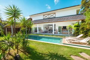 an image of a house with a swimming pool at Bingin Villas Luxury, Concierge and Security in Uluwatu