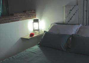 A bed or beds in a room at Apartamentos Rurales Azabal