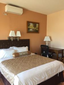 Postel nebo postele na pokoji v ubytování Park Hotel