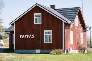 a red barn with the words fatars written on it at Faffas in Österretais +11 photos