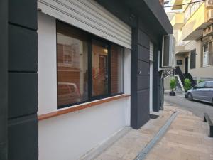a window on the side of a building at City Center Hostel Durres in Durrës